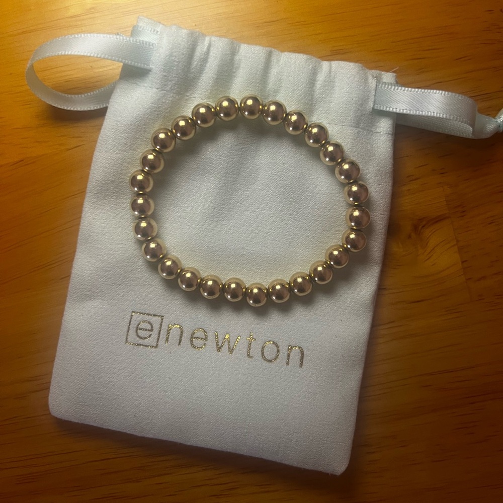 8mm gold Enewton bracelet.